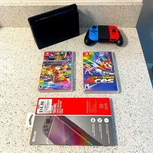 Like new Nintendo Switch (Blue/Red Joy-Con) Incl. Mario Kart + Mario Tennis Aces